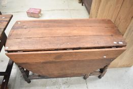 A late 19th or early 20th Century part stripped oak gateleg table