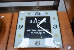A vintage shop clock , Bulova watches