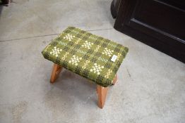 An Arts and Crafts style pine stool