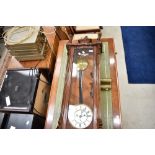 A traditional mahogany cased Vienna wall clock