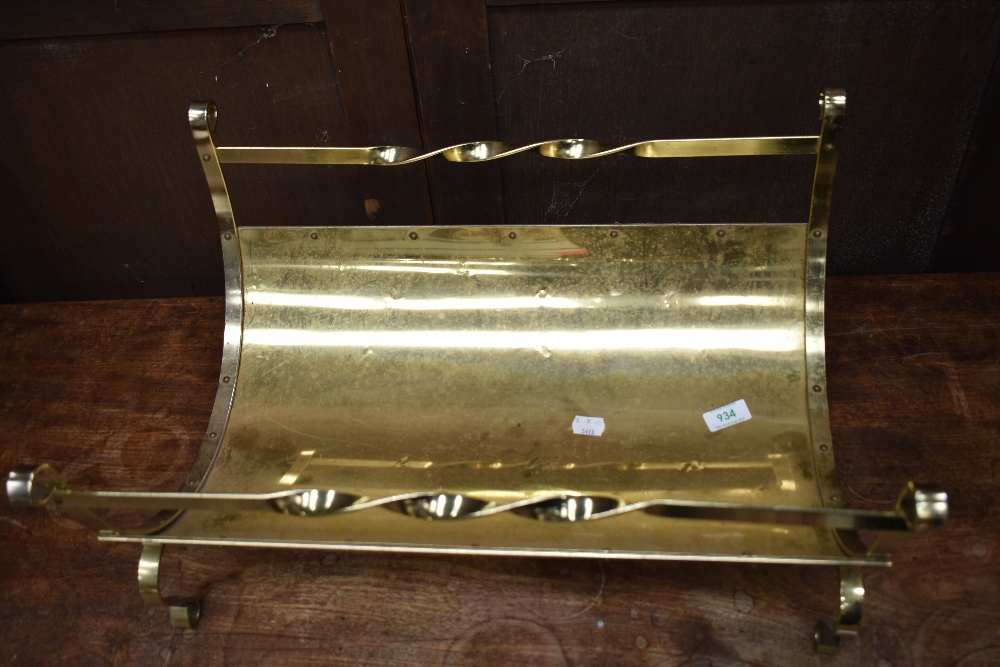 A brass log trug