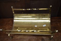 A brass log trug