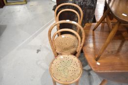 Two traditional stripped bentwood chairs, tall bistro style