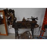 A vintage lathe and accessories