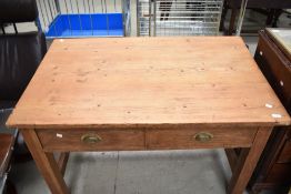 A 19th Century pine side or kitchen table having two frieze drawers