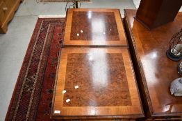 A pair of modern yew wood occasional/coffee tables