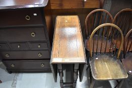 A mid 20th Century oak gate leg dining table