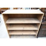 A 19th Century cupboard top adapted to shelf unit, having dove tailed joints
