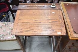An early 20th Century oak school desk