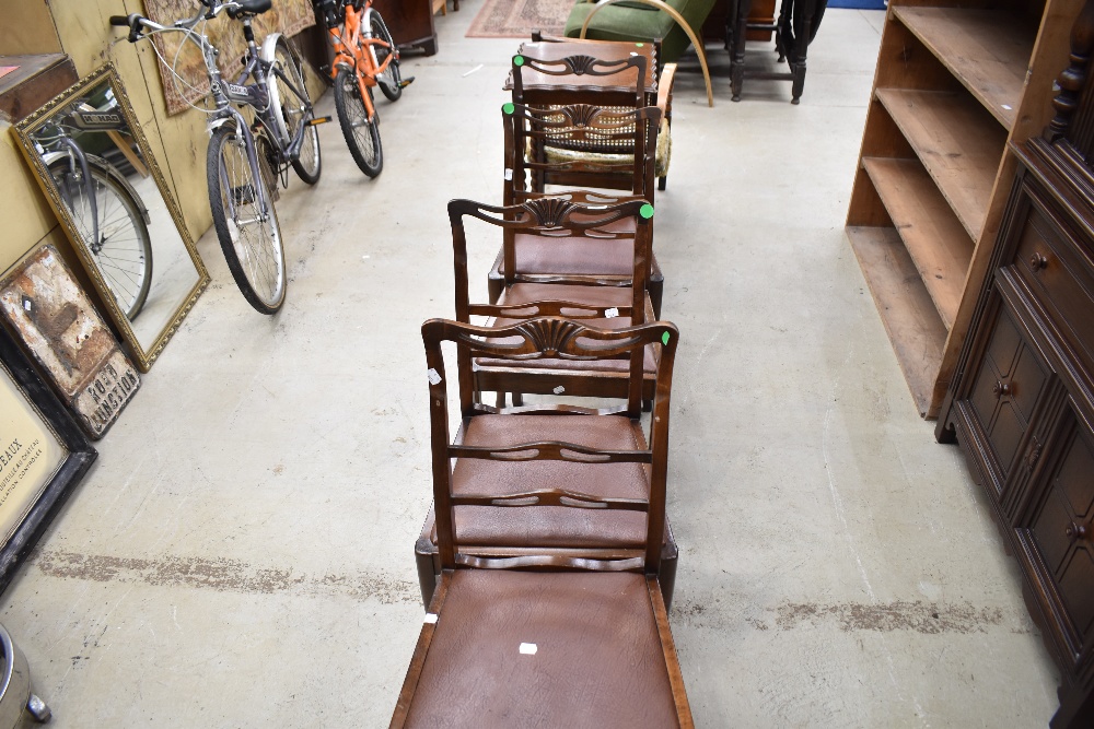A set of four early 20th Century stained frame dining chairs