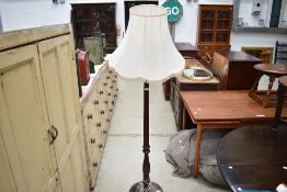 A traditional mahogany standard lamp