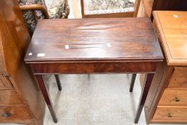 A 19th Century mahogany fold over tea or car table having leather top (af)