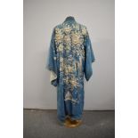 An early 20th century embroidered silk kimono dressing gown, damage to silk part of lining,