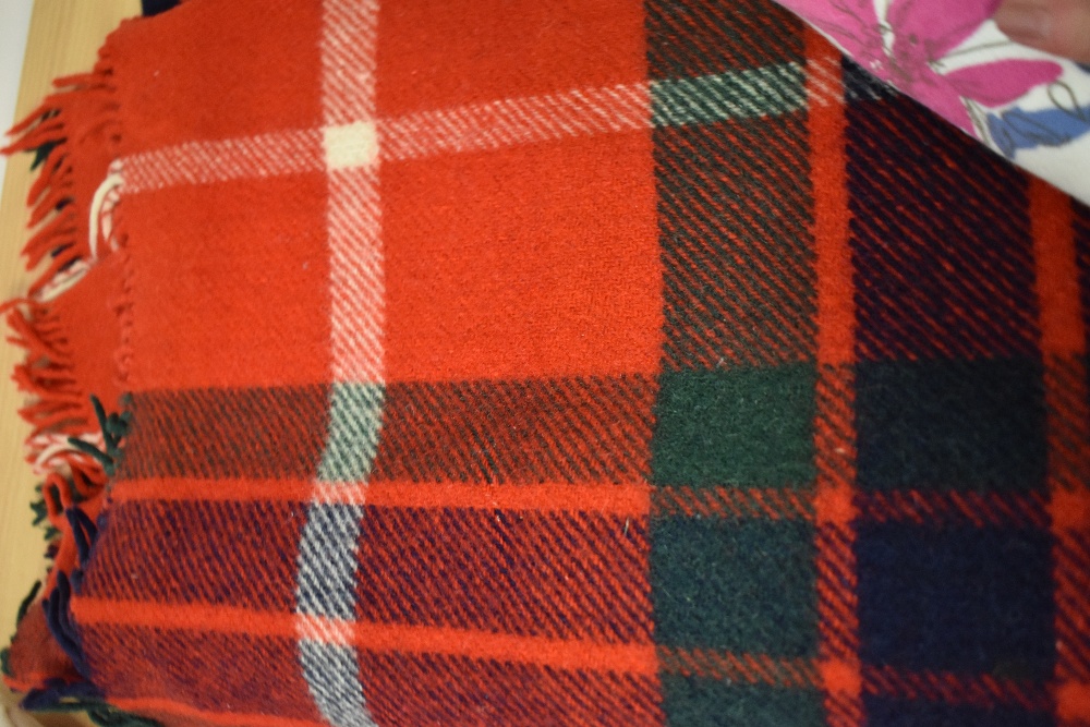 An assortment of vintage bedding and a tartan travel rug. - Image 3 of 7