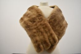 A 1950s blonde mink wrap or stole.