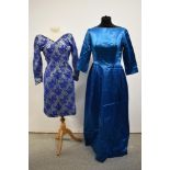 A 1960s teal blue satin maxi dress and a late 1950s satin with lace overlay dress in pale blue and