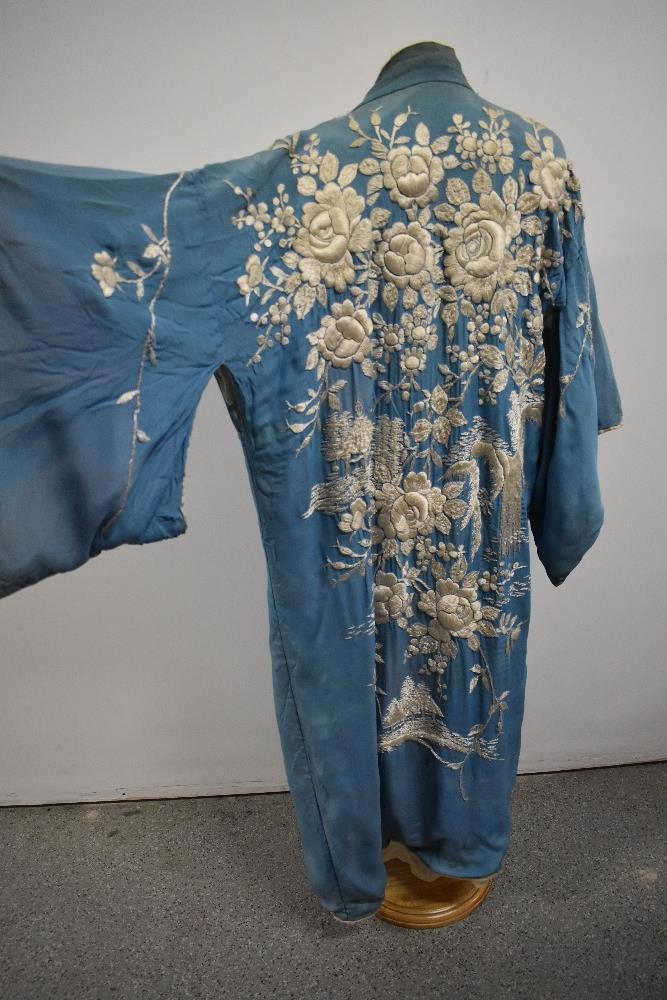An early 20th century embroidered silk kimono dressing gown, damage to silk part of lining, - Image 2 of 12