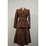 A 1940s Pandem model beige and cranberry wool herringbone ladies suit comprising of jacket and