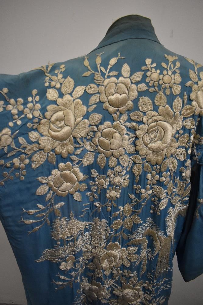 An early 20th century embroidered silk kimono dressing gown, damage to silk part of lining, - Image 4 of 12