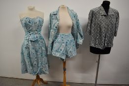 A late 1950s/ early 1960s four piece beach set comprising of sun top and shorts, shirt and skirt,