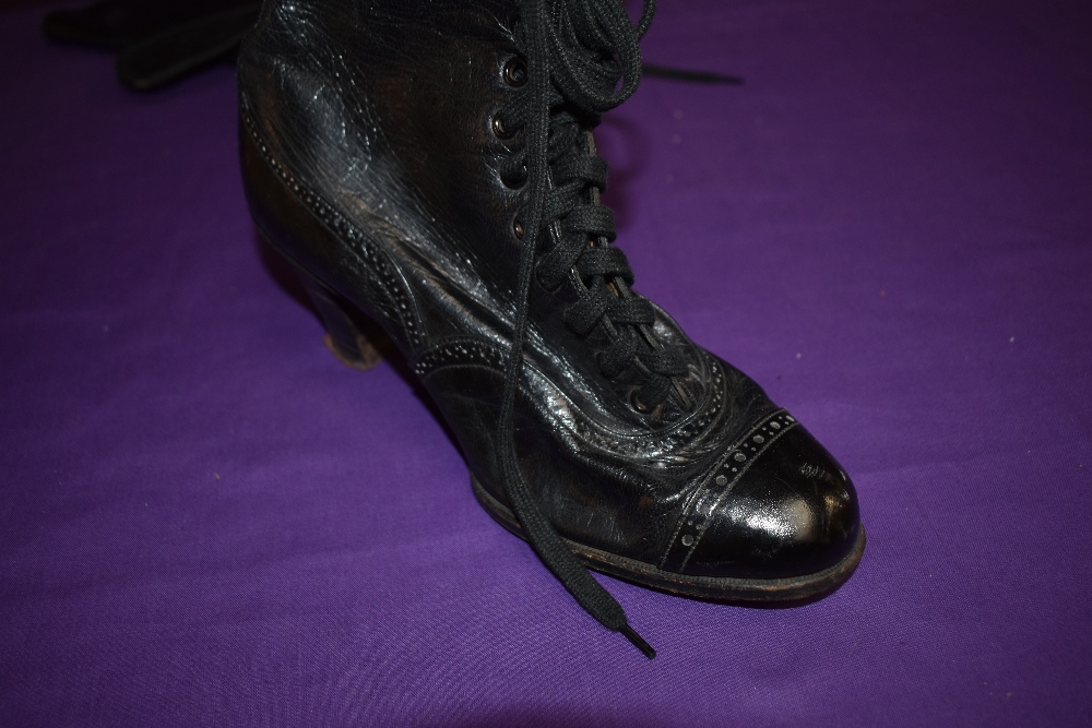 A pair of black late 19th/ early 20th century lace up boots having stack heel. - Image 6 of 6