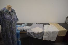 A selection of vintage and retro slips and underwear, also included is a late 1950s nylon house coat