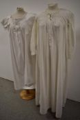A Victorian shift and a Victorian full length nightdress with lace detailing and ribbon to bodice.