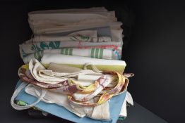 A box full of vintage and antique table linen (and a few huckaback towels) some with embroidery,