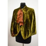 A Victorian moss green cape having brown quilted lining and bow to neckline, John Lewis Oxford
