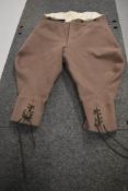 A pair of gents 1940s taupe wool breeches or jodhpurs having button fly.
