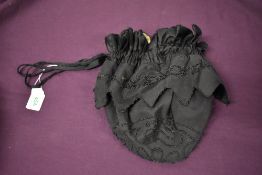 A Victorian beaded drawstring bag.