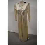 A 1940s Marshall and Snelgrove Southport wedding dress with sweetheart neckline, sash belt to waist,