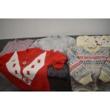 A selection of vintage and retro chunky knit ladies jumpers.
