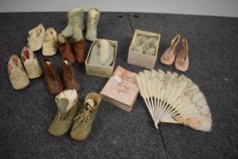 A box of antique children's boots and shoes, one pair of fur edged quilted slippers still in
