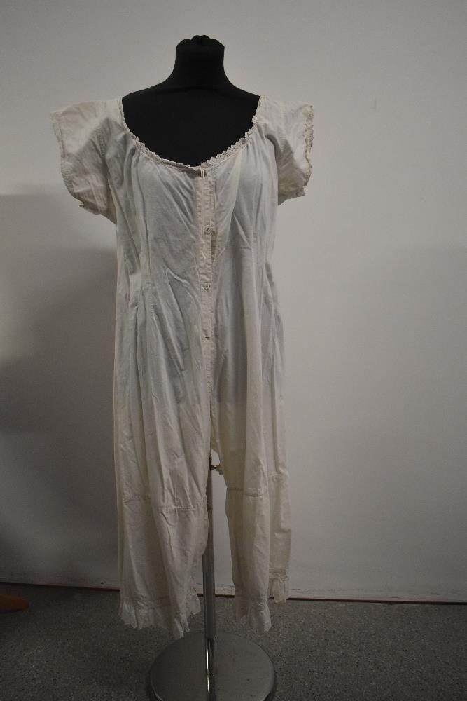 A Rare Victorian ladies all in one cotton split leg undergarment with...