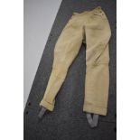 A pair of ladies 1940s cord jodhpurs/ breeches, buttons to both sides.