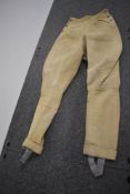 A pair of ladies 1940s cord jodhpurs/ breeches, buttons to both sides.