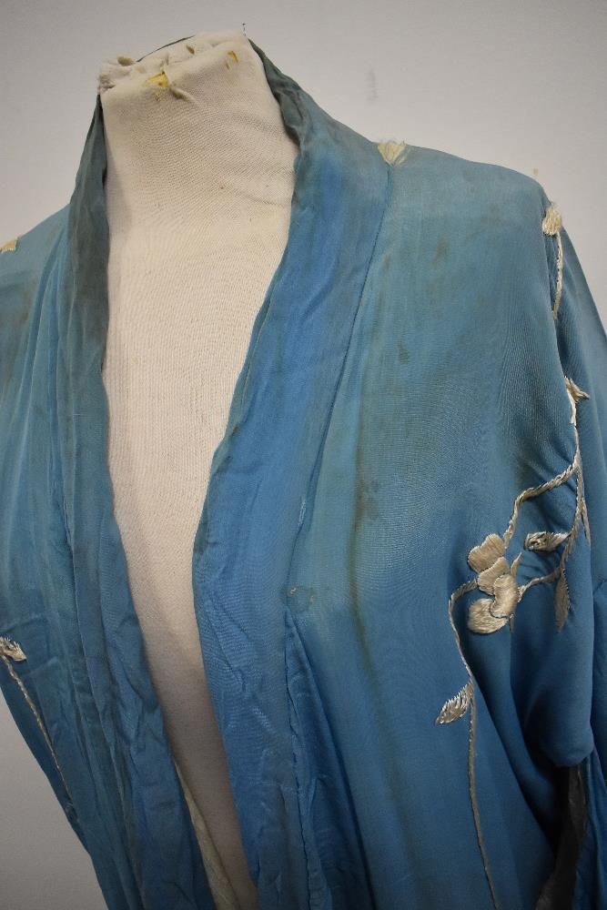 An early 20th century embroidered silk kimono dressing gown, damage to silk part of lining, - Image 10 of 12