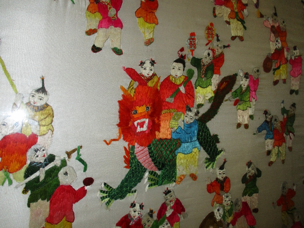 A framed and glazed 20th century silk thread embroidery 'one hundred children'. - Image 2 of 5