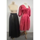 A vintage 1940s/50s evening skirt, having later had a seam opened to create a split and edged in