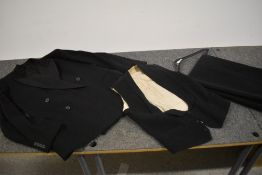 A gents black CC41 utility labelled dinner jacket, also included are a waistcoat and trousers that
