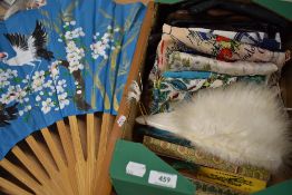 A mixed box of vintage fans, gloves and headscarves.