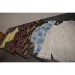 Six ladies vintage tops and blouses in vibrant patterns, various sizes and styles.