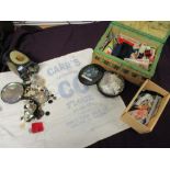 A mixed lot of haberdashery, including buttons, fastenings, thread and similar, sold alongside a
