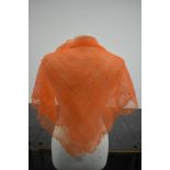 A vintage 1960s hand frame knitted orange mohair scarf.