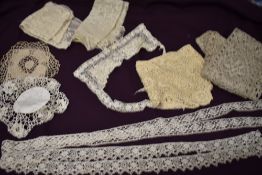 An assortment of antique lace and similar, including Victorian stoles.