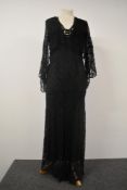 A 1930s black lace bias cut evening gown with silk lining and bolero.