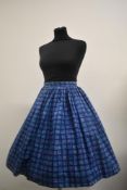 A 1950s cotton skirt with abstract print.