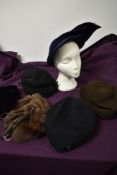 A lovely lot of 1940s and 1950s hats, some beautiful shapes and styles including blue felt