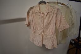 A selection of vintage blouses including 1940s polka dot cotton blouse with unusual collar.